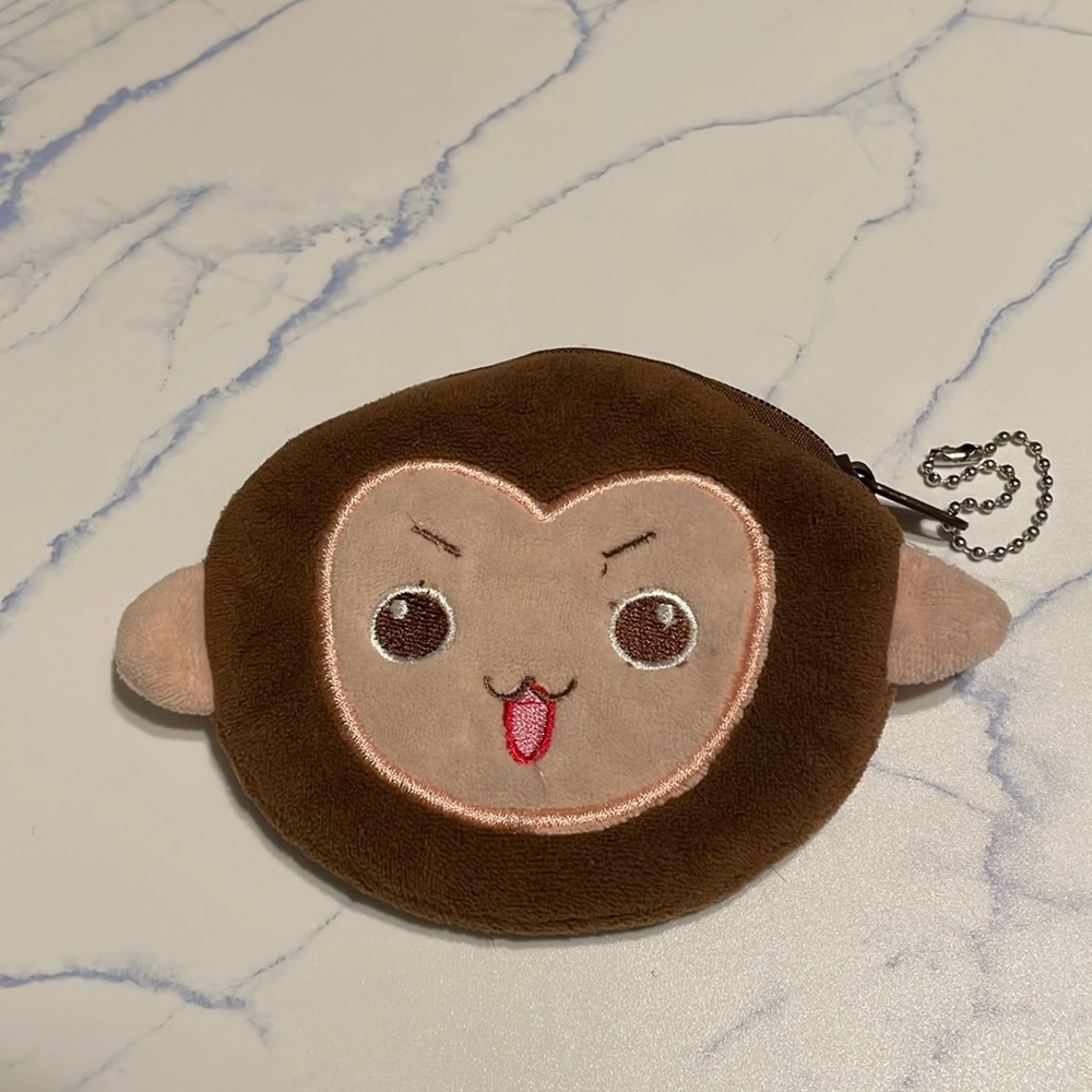 Monkey Coin purse- like new condition, soft material zippered closure.